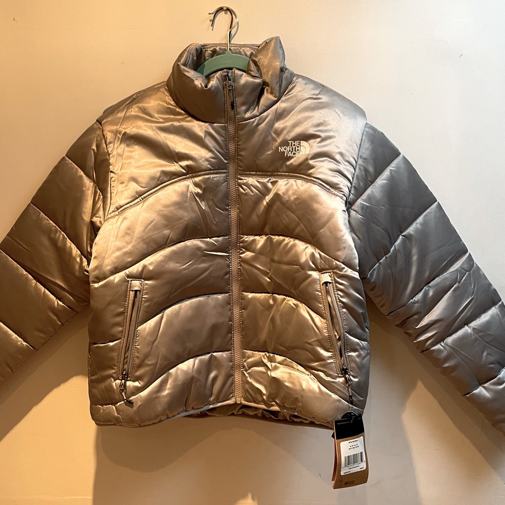 Brand new The North Face Puffer Jacket! Silver, very beautiful color in person.